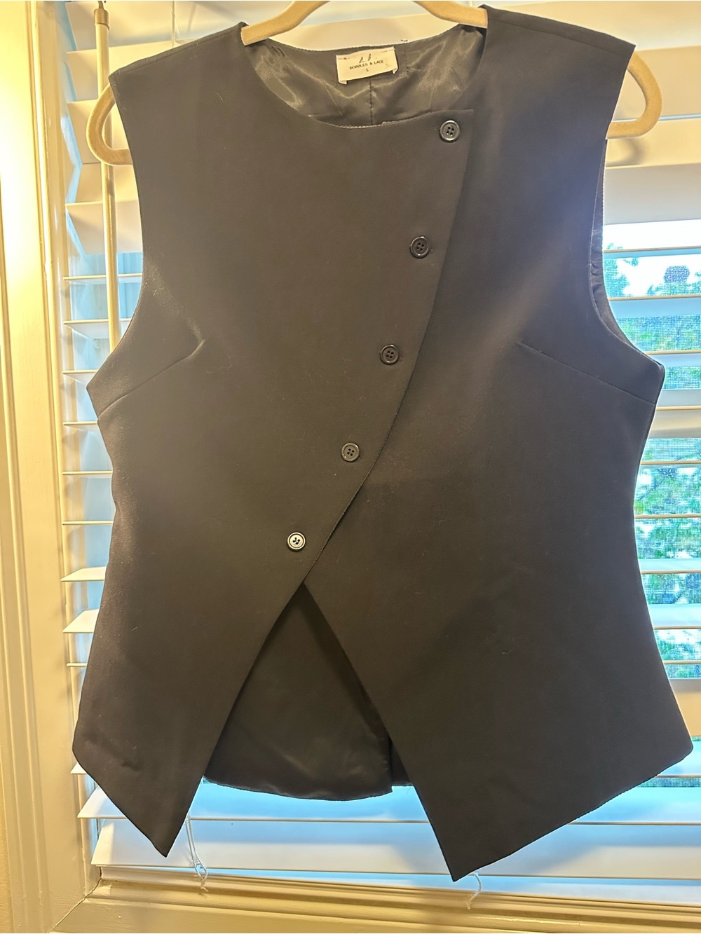 Sleeveless Asymmetric Button Vest in Black
